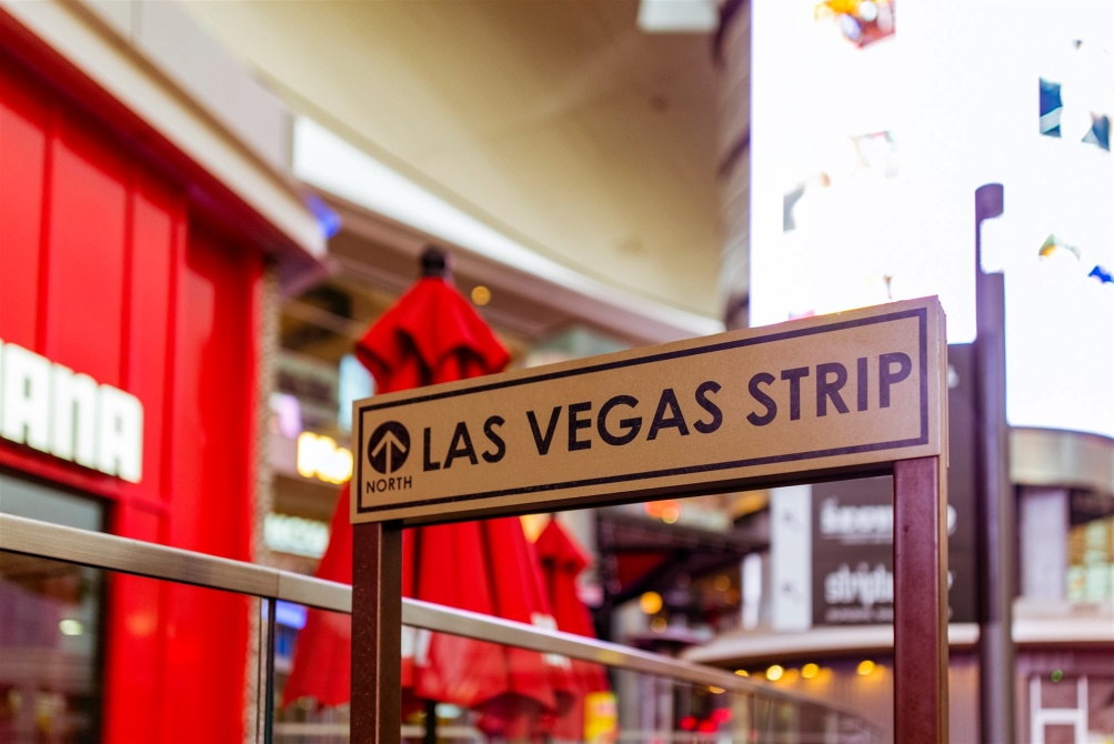 Street sign giving directions to Las Vegas Strip