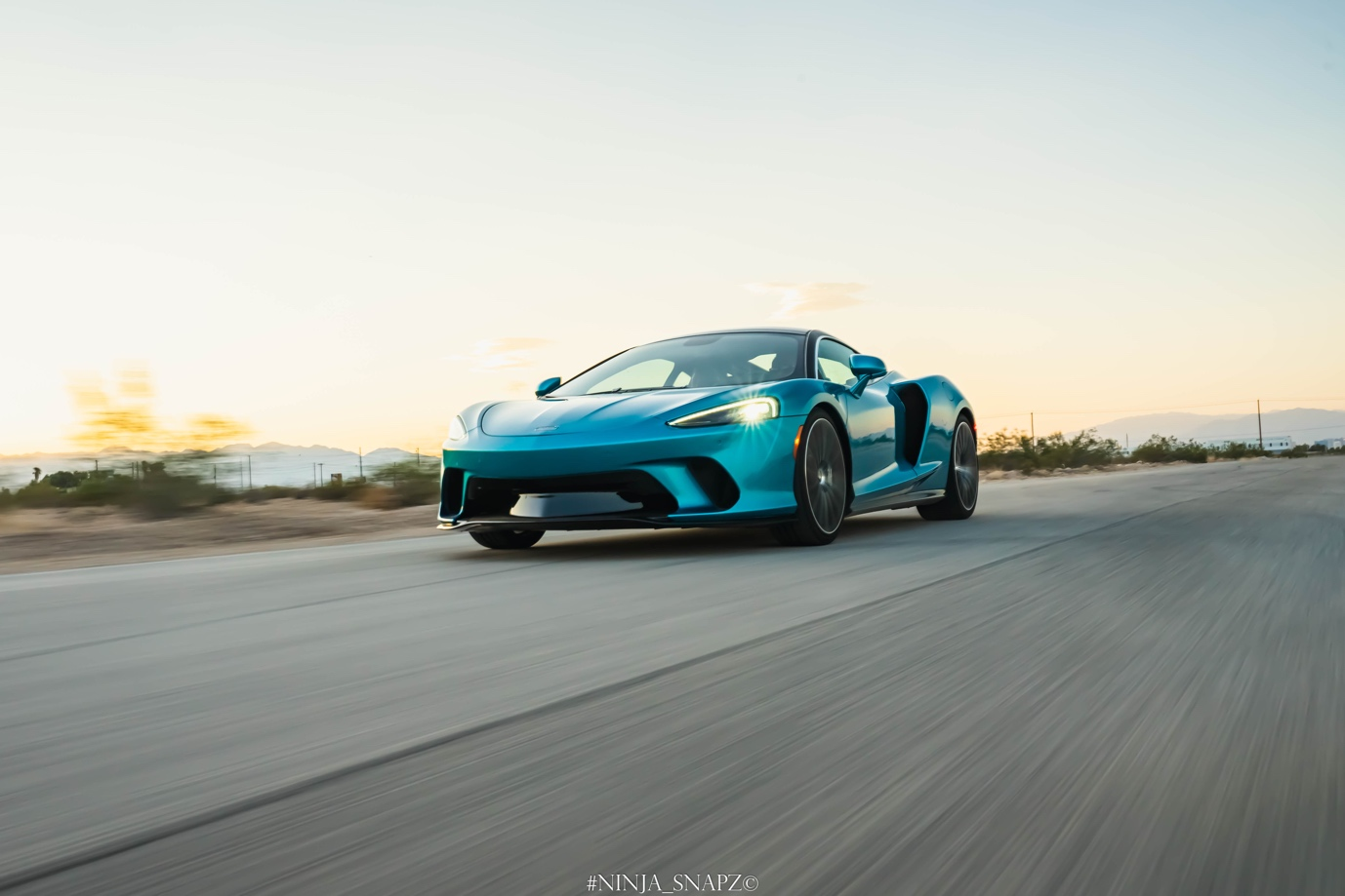 Blue Lamborghini on the road