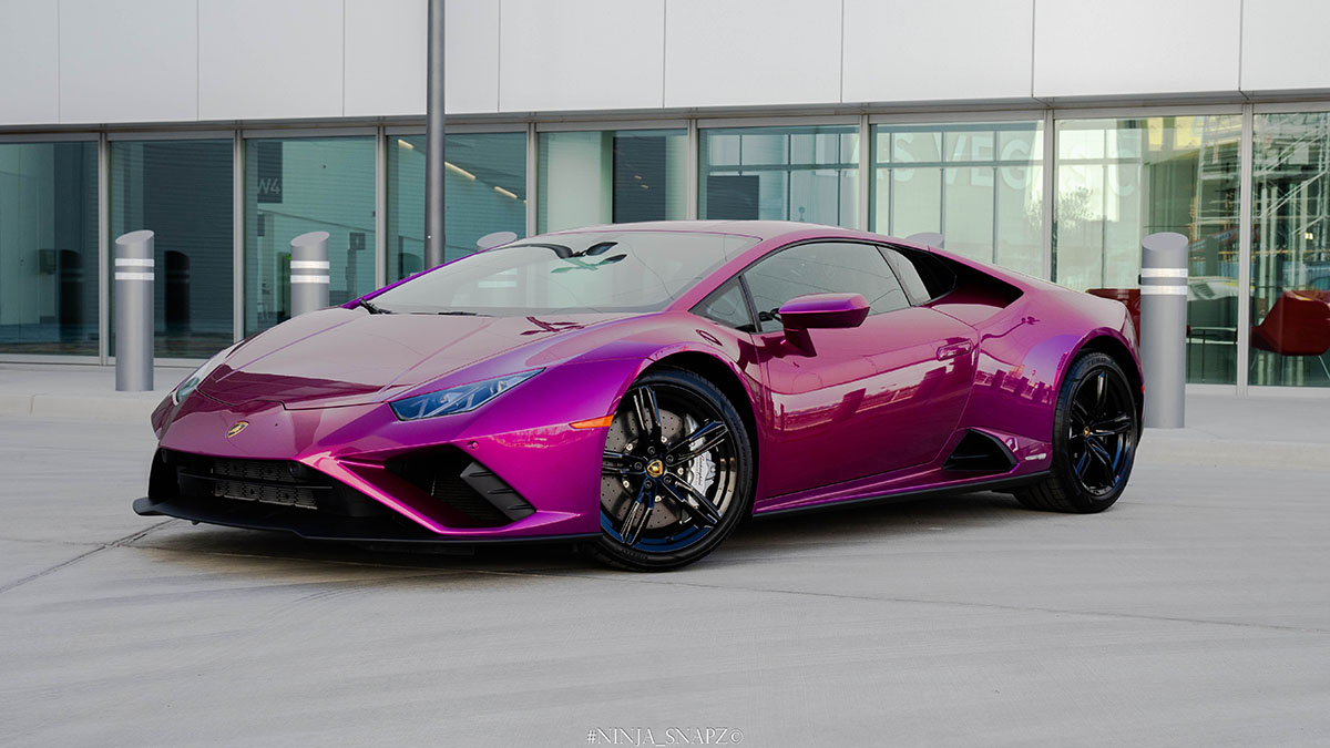 A purple luxury car rental