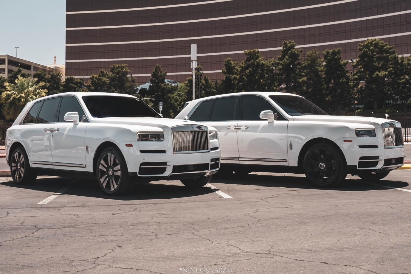  Two Cullinan cars in a parking